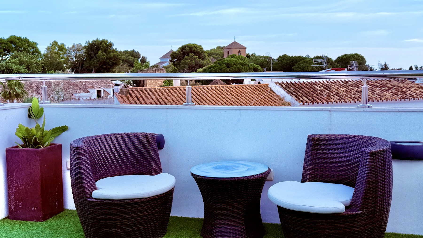 Skydeck corner with tiled rooftops and the church tower