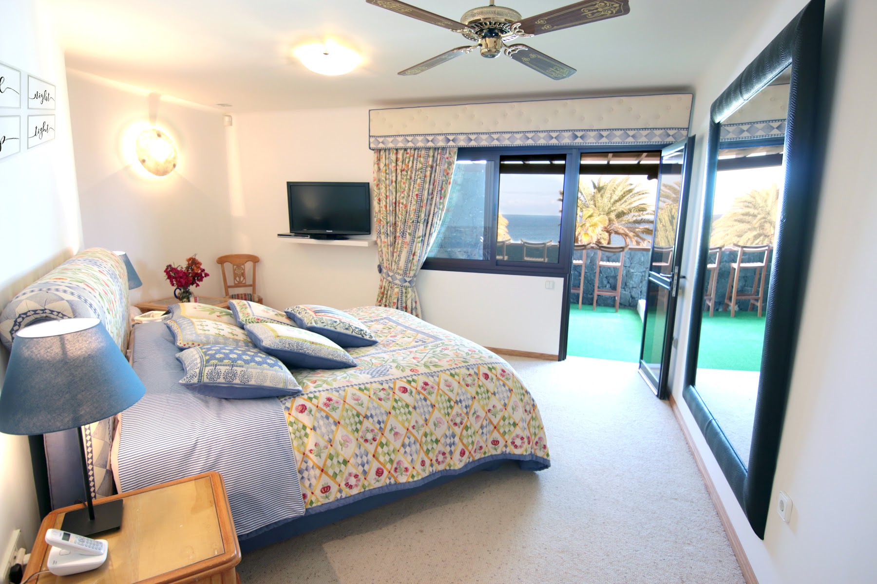 Master bedroom with terrace doors opening to the ocean
