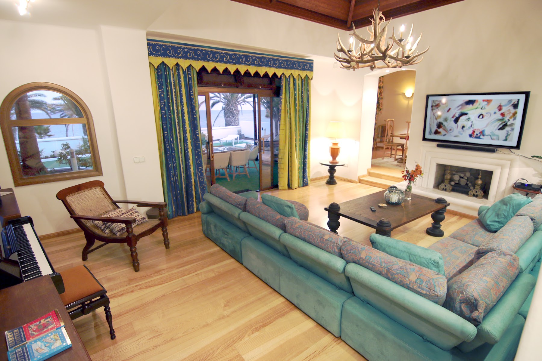 The villa's living room looking out to the ocean