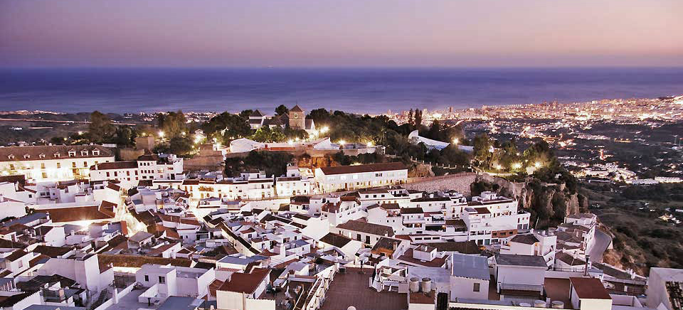 Mijas Pueblo from above — white village between mountain and sea